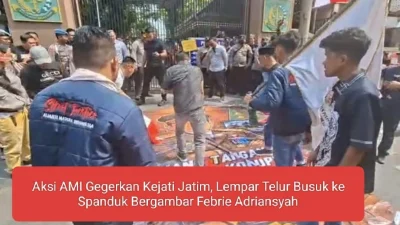 Aksi AMI Gegerkan Kejati Jatim, Lempar Telur Busuk ke Spanduk Bergambar Febrie Adriansyah